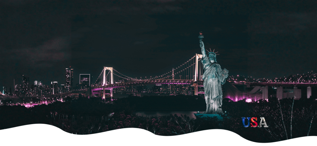 Silhouette of a city skyline with the Statue of Liberty against a purple and blue sky.
